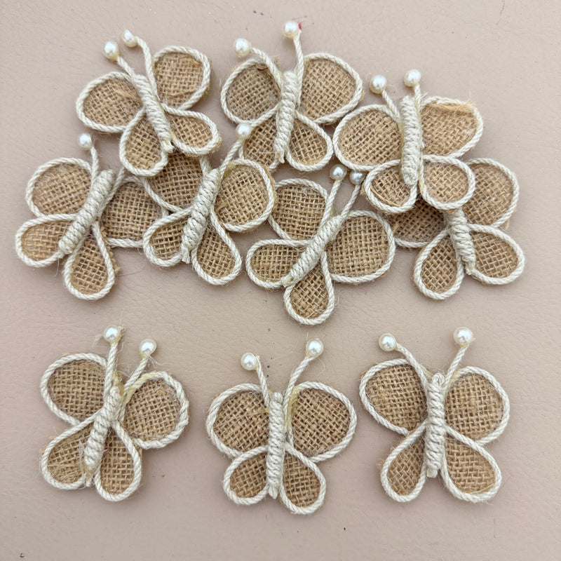 Pack of 5 Handmade Jute Burlap Butterfly Patches on beige background