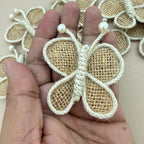 Jute Burlap Butterfly Patch held in hand showing size