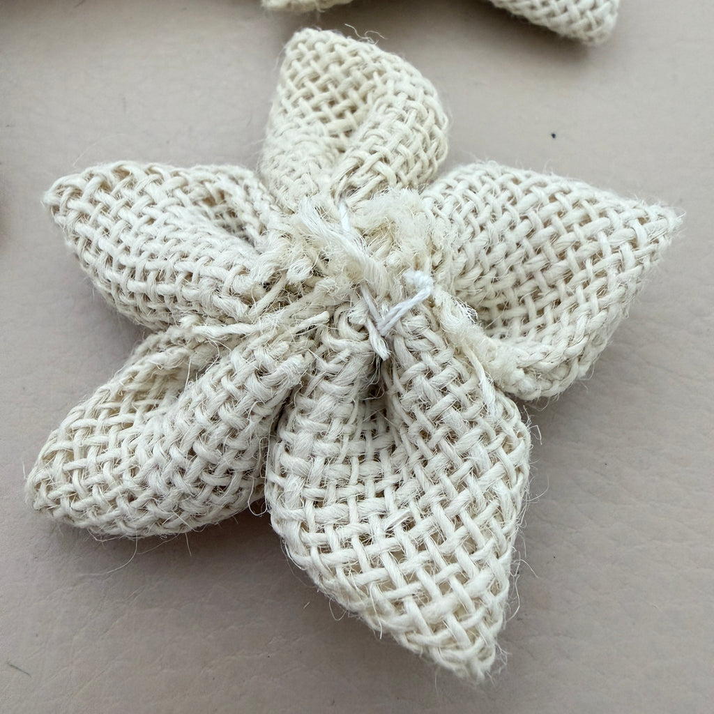 Back view of natural white jute burlap flower patch showing neat tied finish