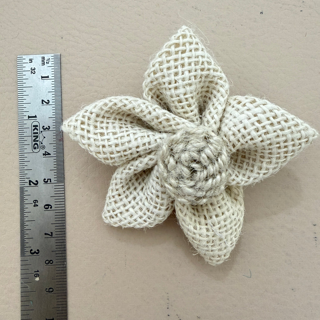 Natural white jute burlap flower patch with ruler showing approx 7-8cm diameter