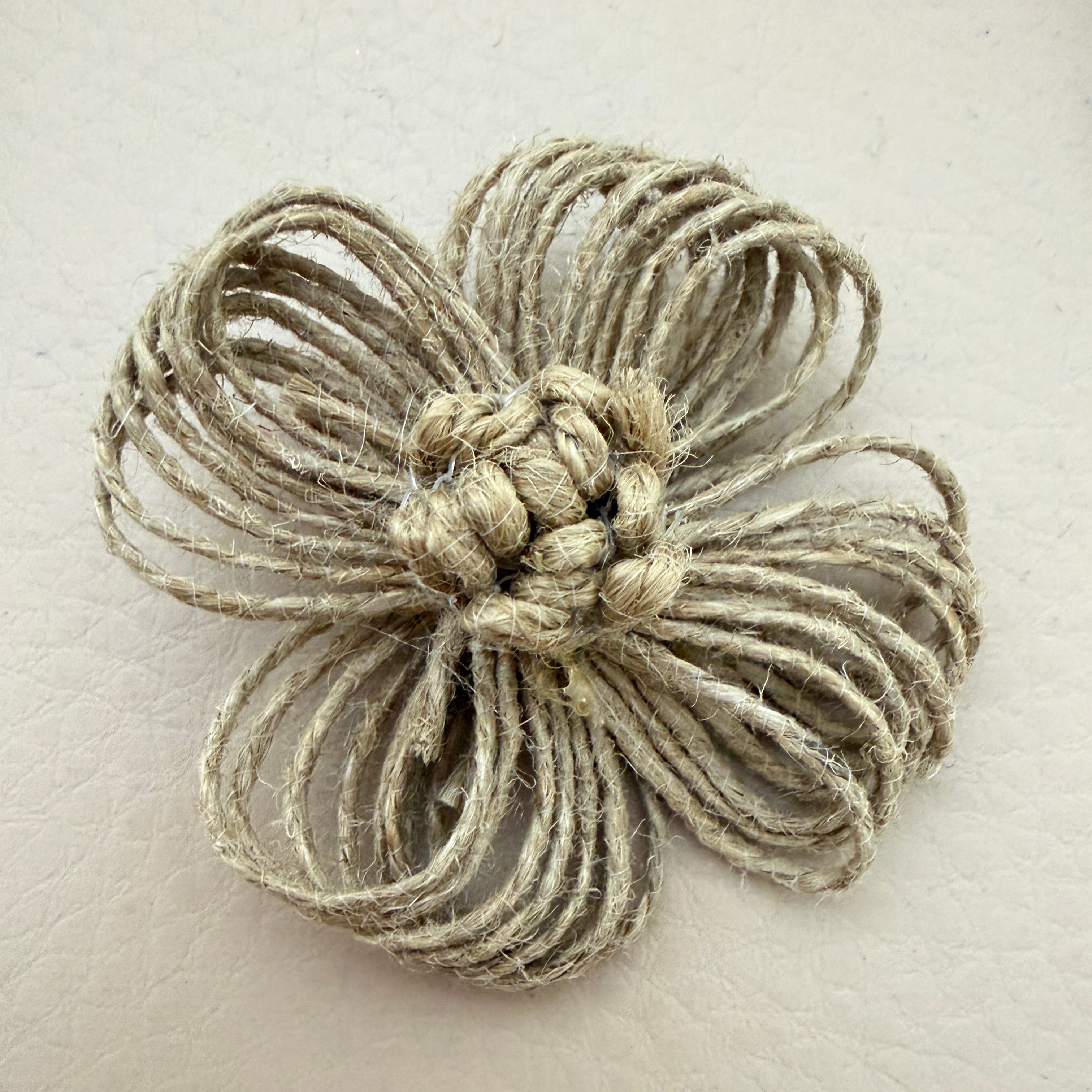 Single jute twine flower patch showing full front detail