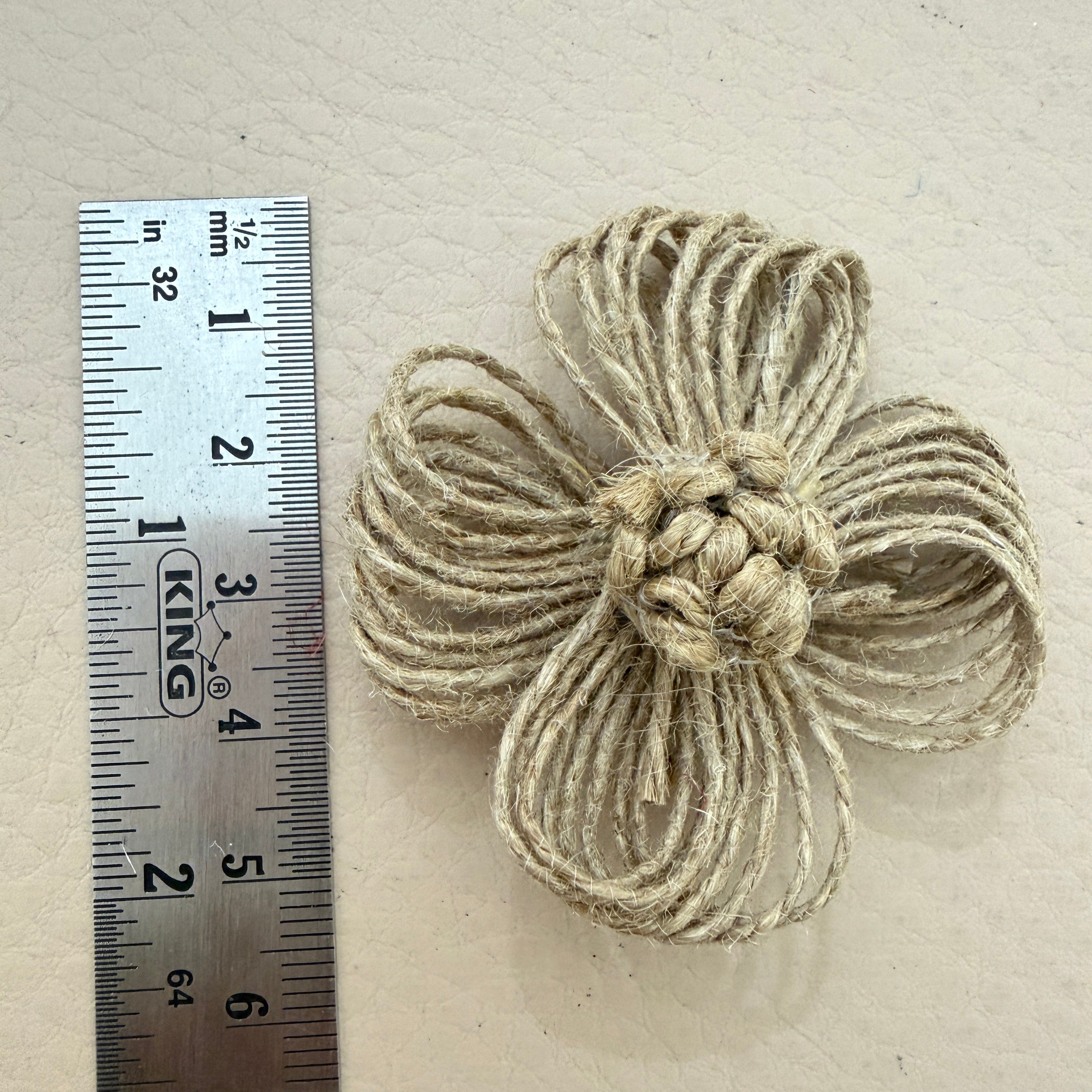 Jute twine flower patch with ruler showing approx 5-6cm diameter