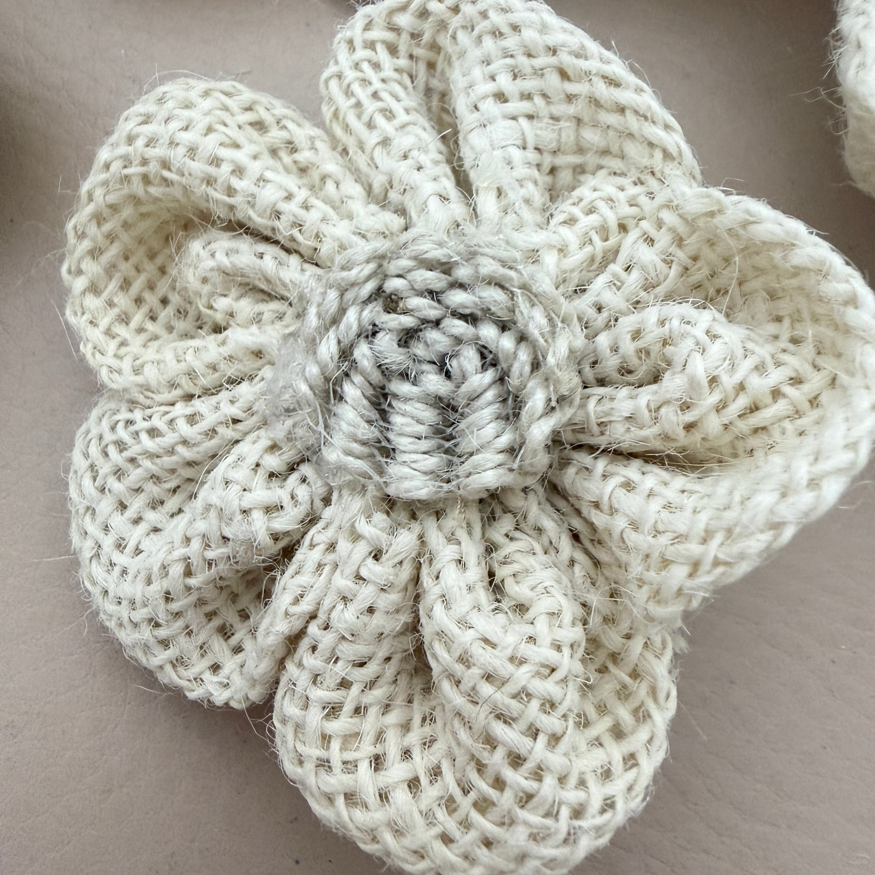 Close-up of single 3D puffed burlap flower patch showing twisted rope rosette centre