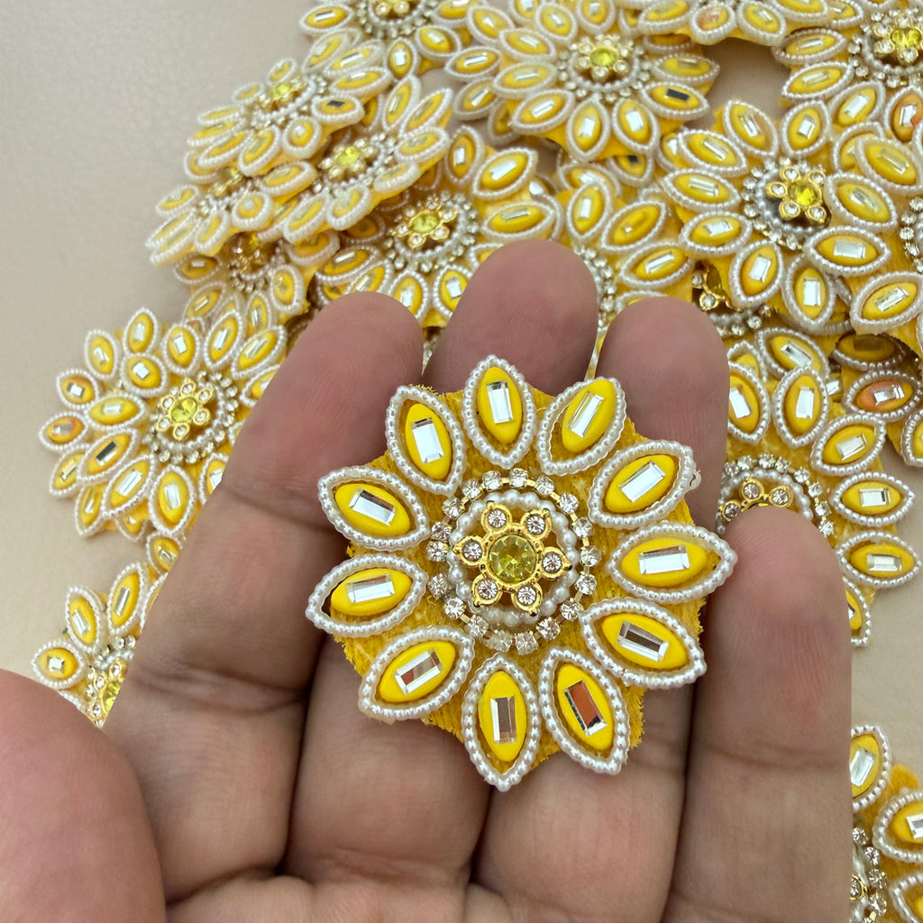 10 yellow floral patches arranged in a circle