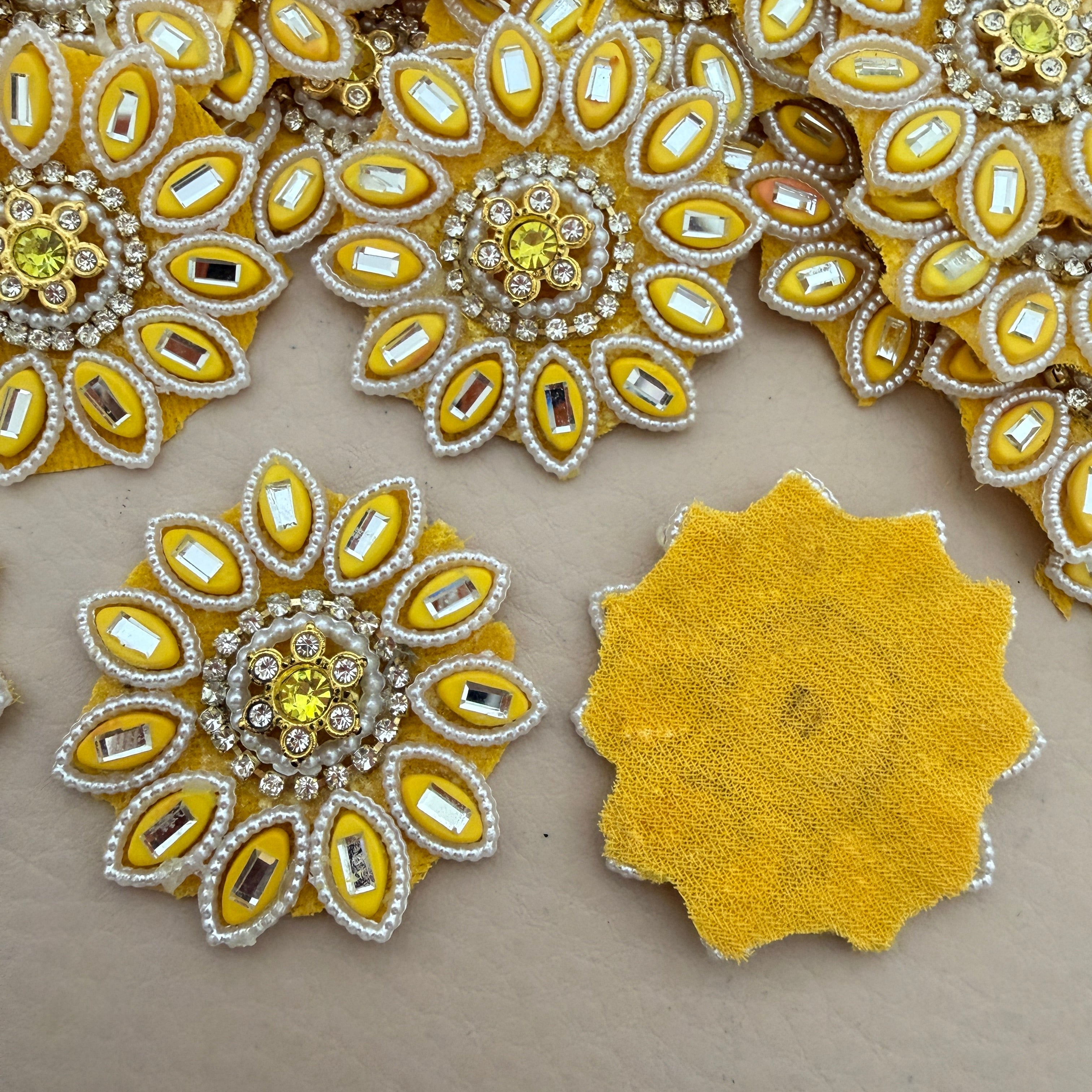 Front and back view of yellow floral rhinestone patch
