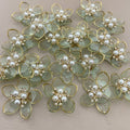 Mint green pearl flower patches bulk view