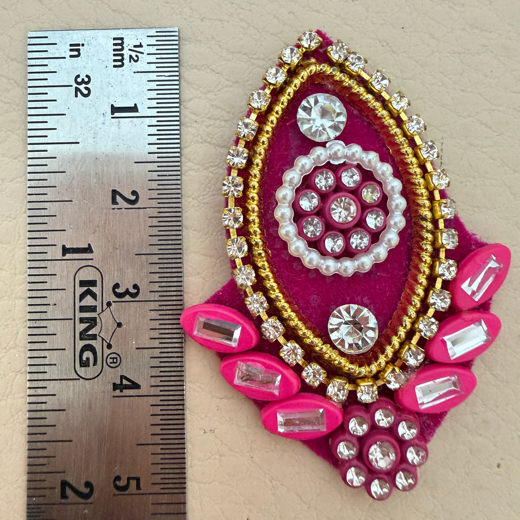 Rani pink rhinestone patches pair close-up detail view