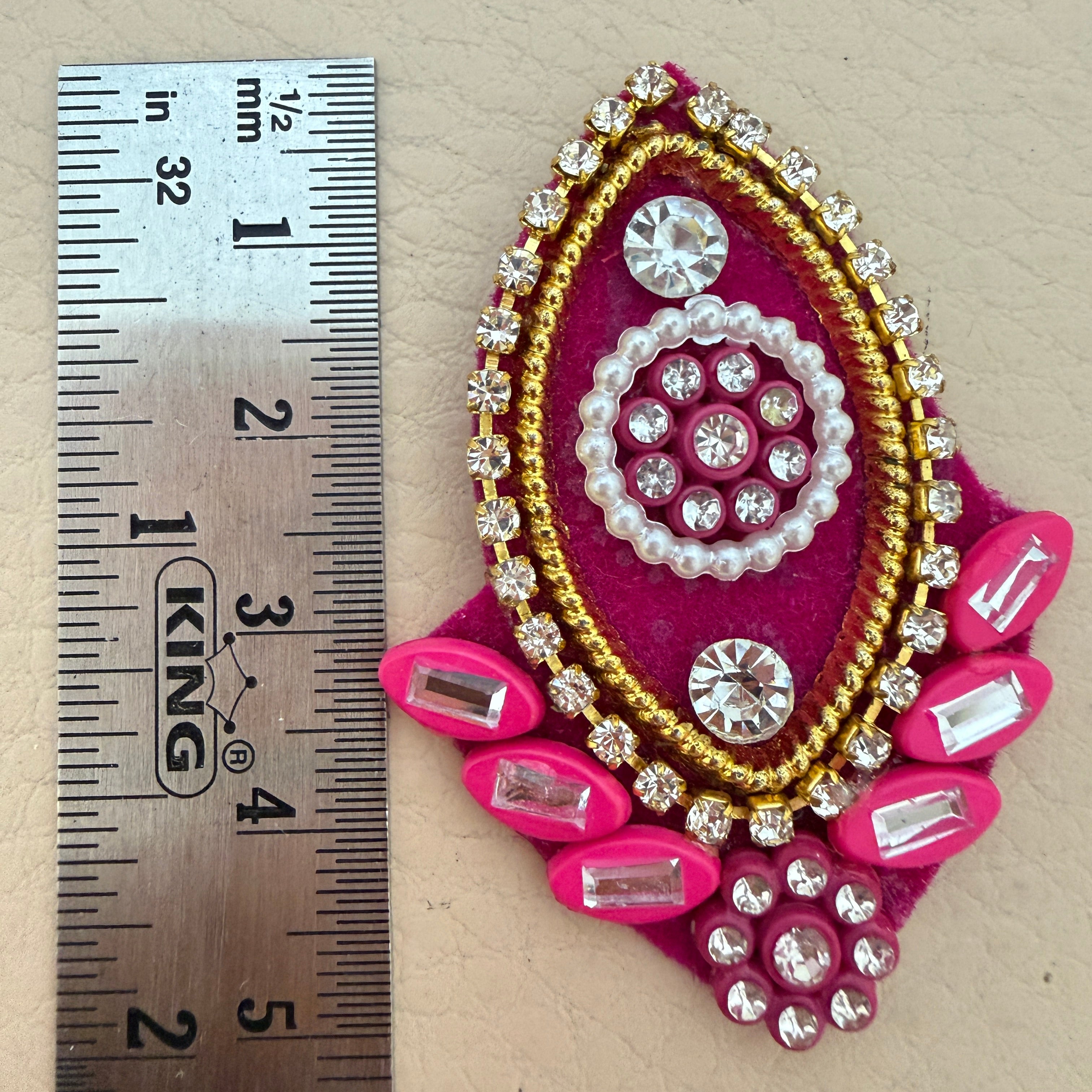 Rani pink rhinestone patches pair close-up detail view