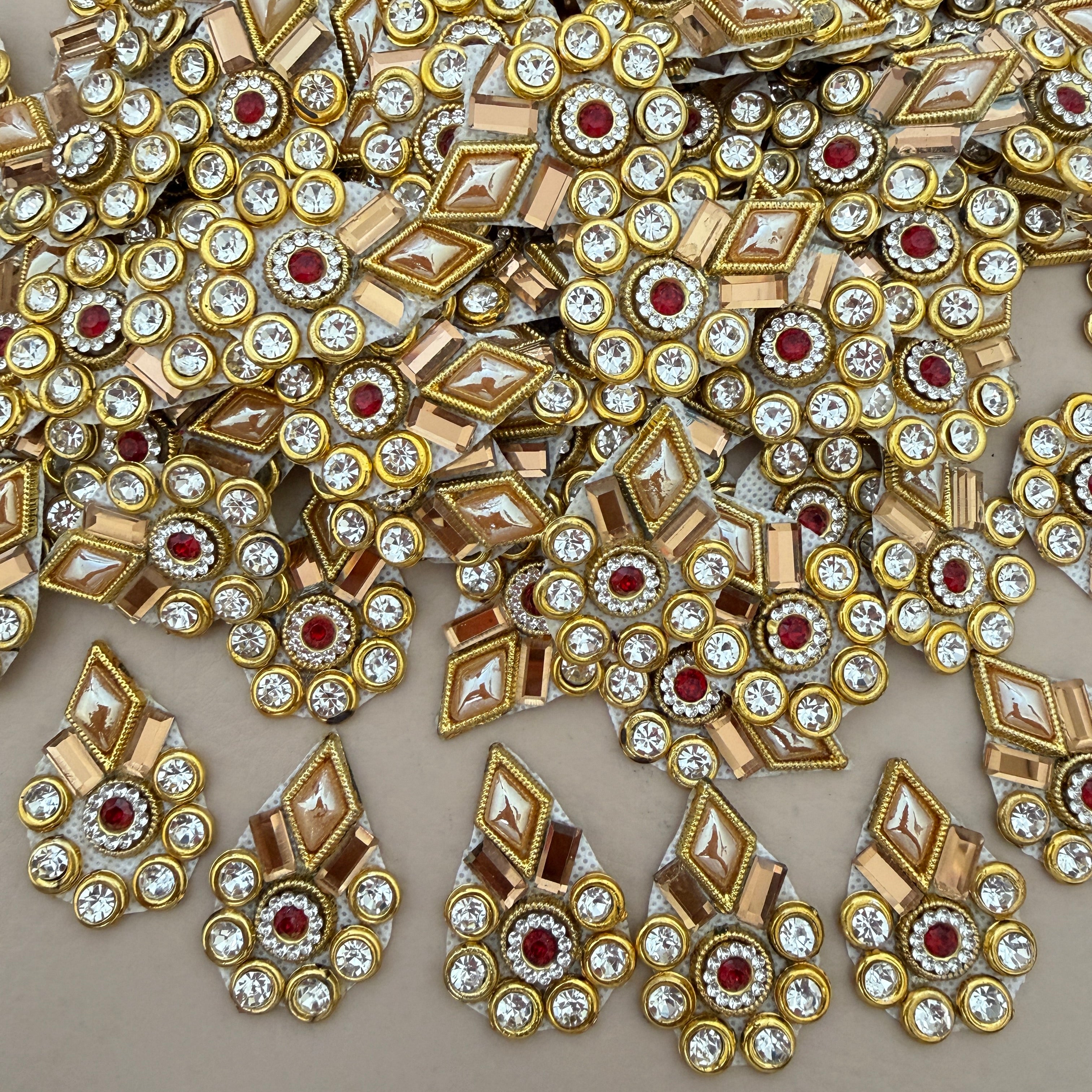 Gold rhinestone embellishment patch with ruler for size reference