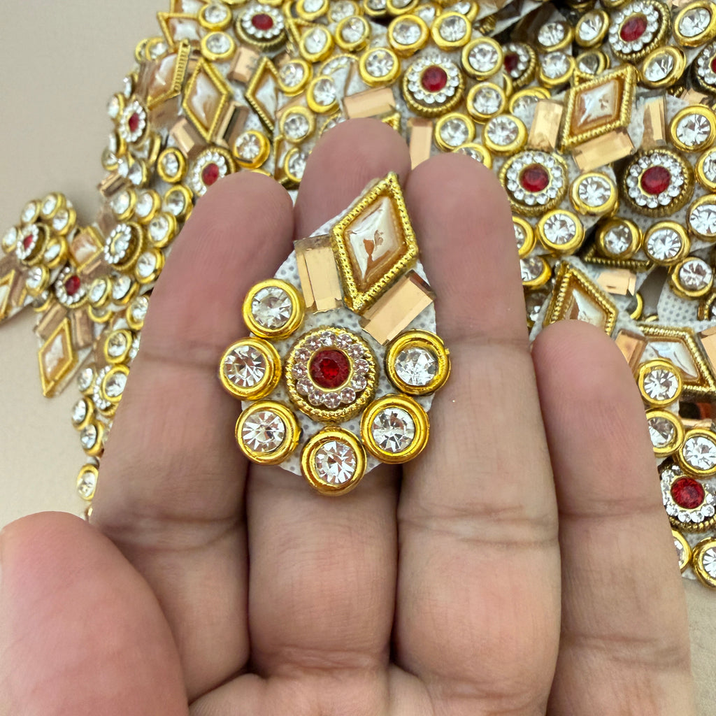 Front and back view of gold rhinestone patch showing mesh backing