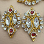 Hand holding a gold diamond rhinestone patch to show size