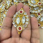 Front and back view of gold diamond rhinestone patch showing mesh backing