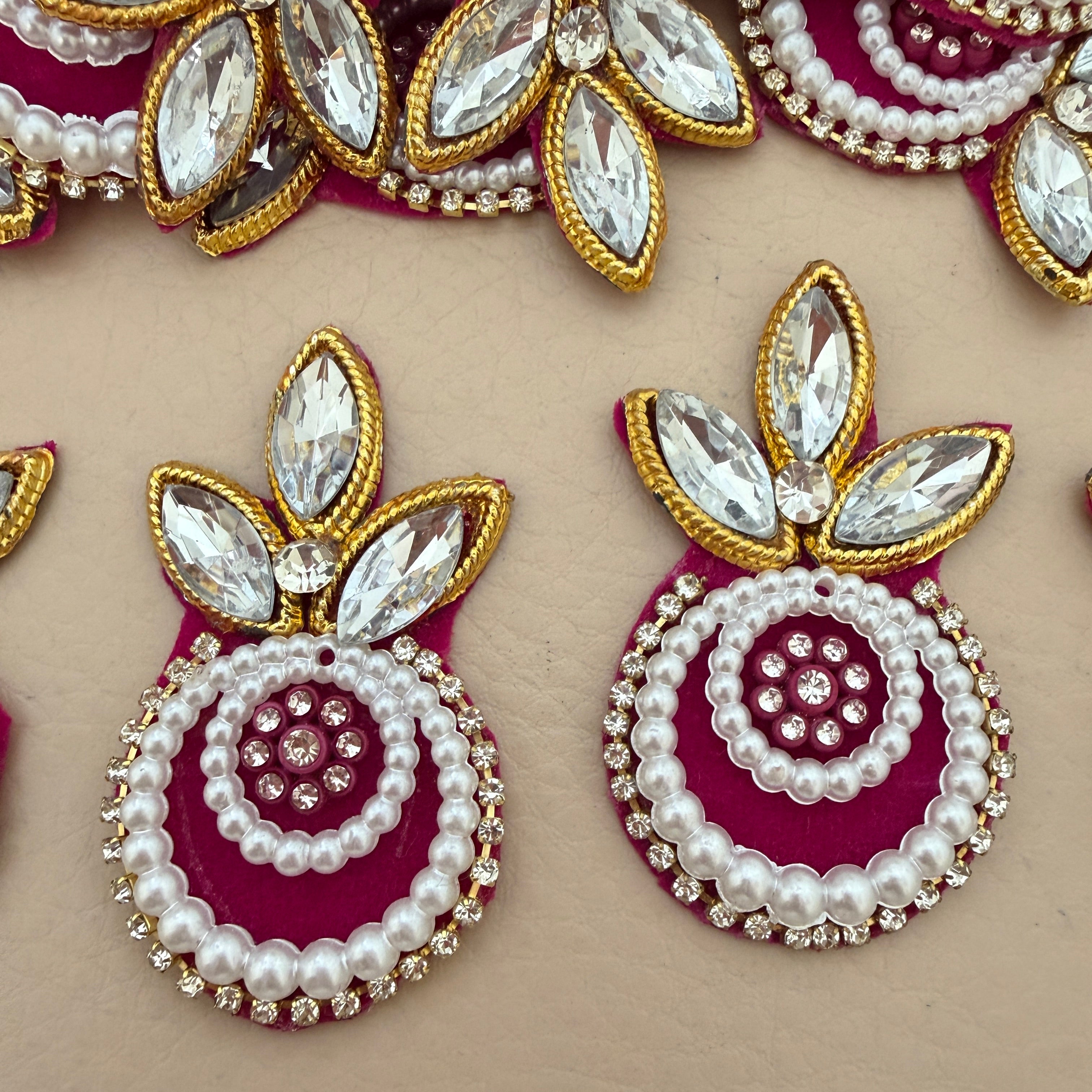 Maroon pearl crystal patch with ruler for size reference