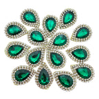 Front and back view of emerald teardrop patch showing fabric backing