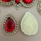 Front and back view of red teardrop patch showing net backing