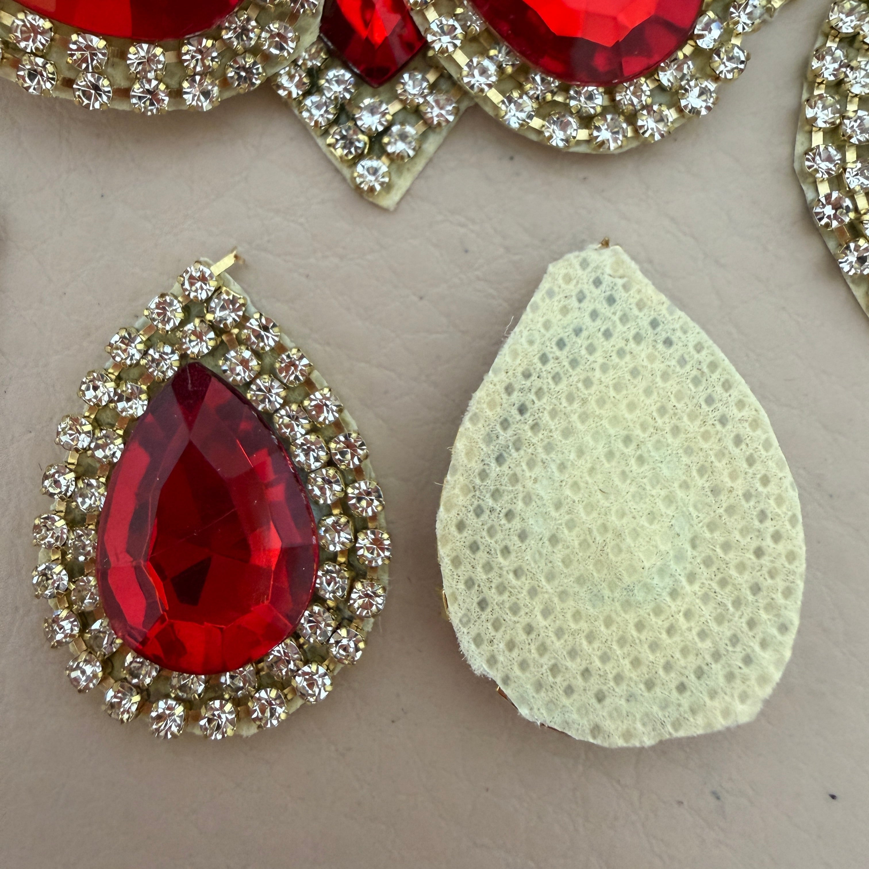 Front and back view of red teardrop patch showing net backing