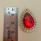 Single red teardrop patch with ruler – approx 3.5cm size reference