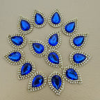 15 royal blue teardrop rhinestone patches arranged in a circle – pack contents