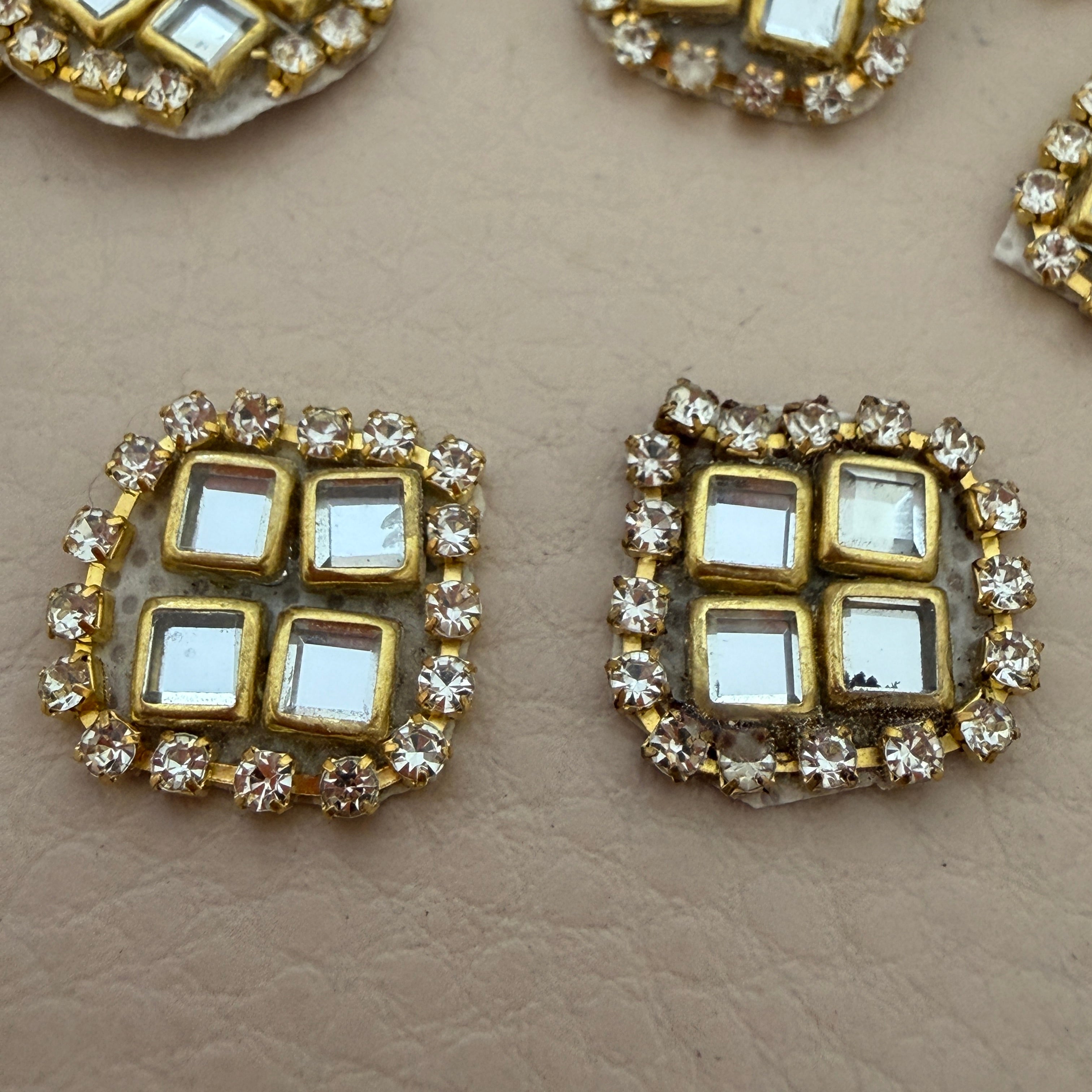 Close-up of kundan rhinestone patches showing front detail