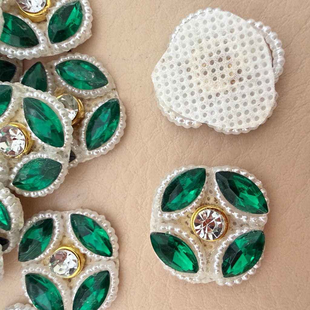 Front and back view of emerald rhinestone patch showing perforated mesh backing