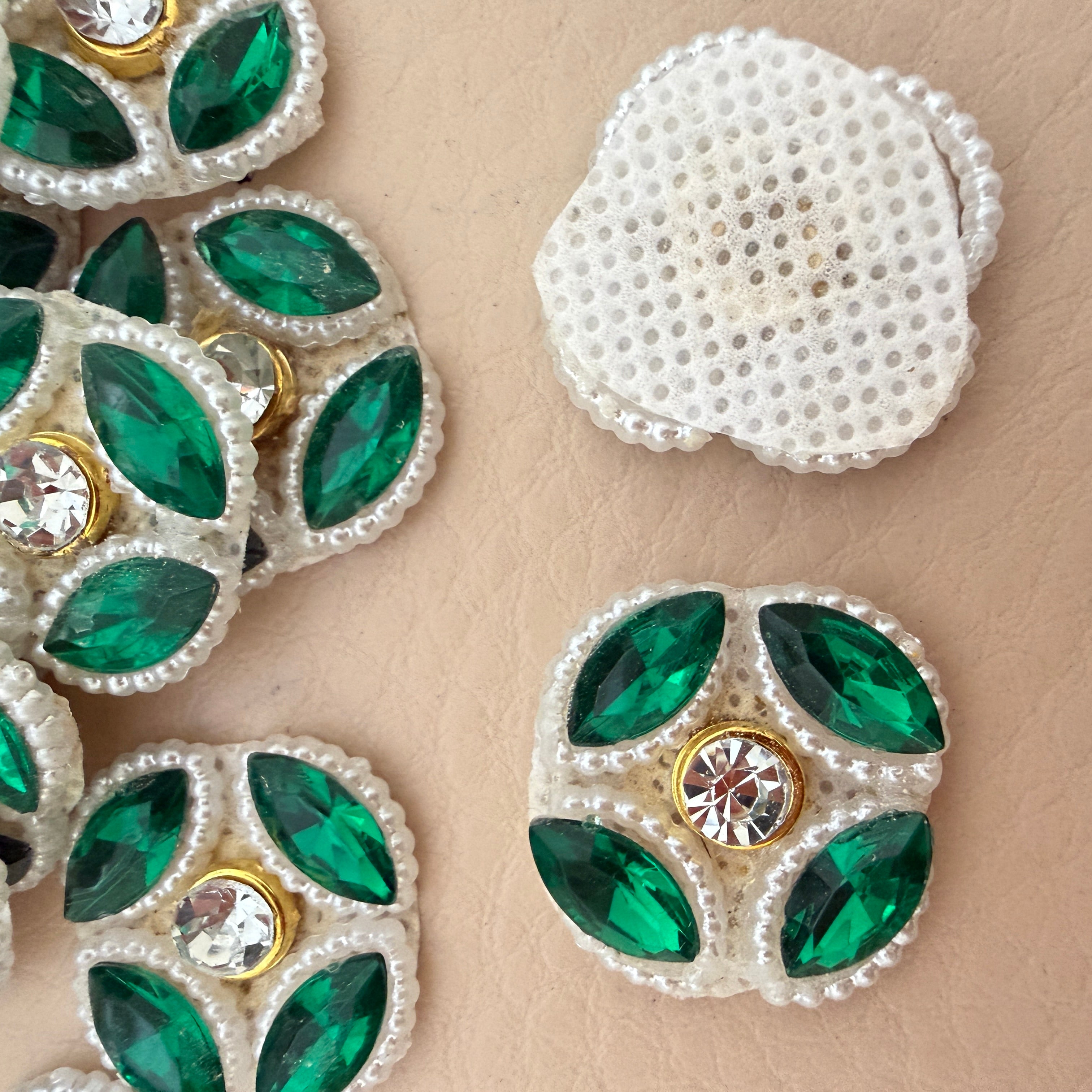 Front and back view of emerald rhinestone patch showing perforated mesh backing