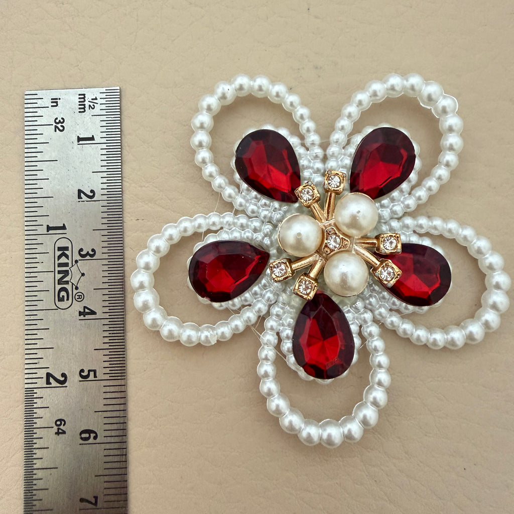 Red crystal pearl flower patches – bulk lot view