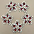 Red crystal pearl flower patch – front and back view showing felt backing