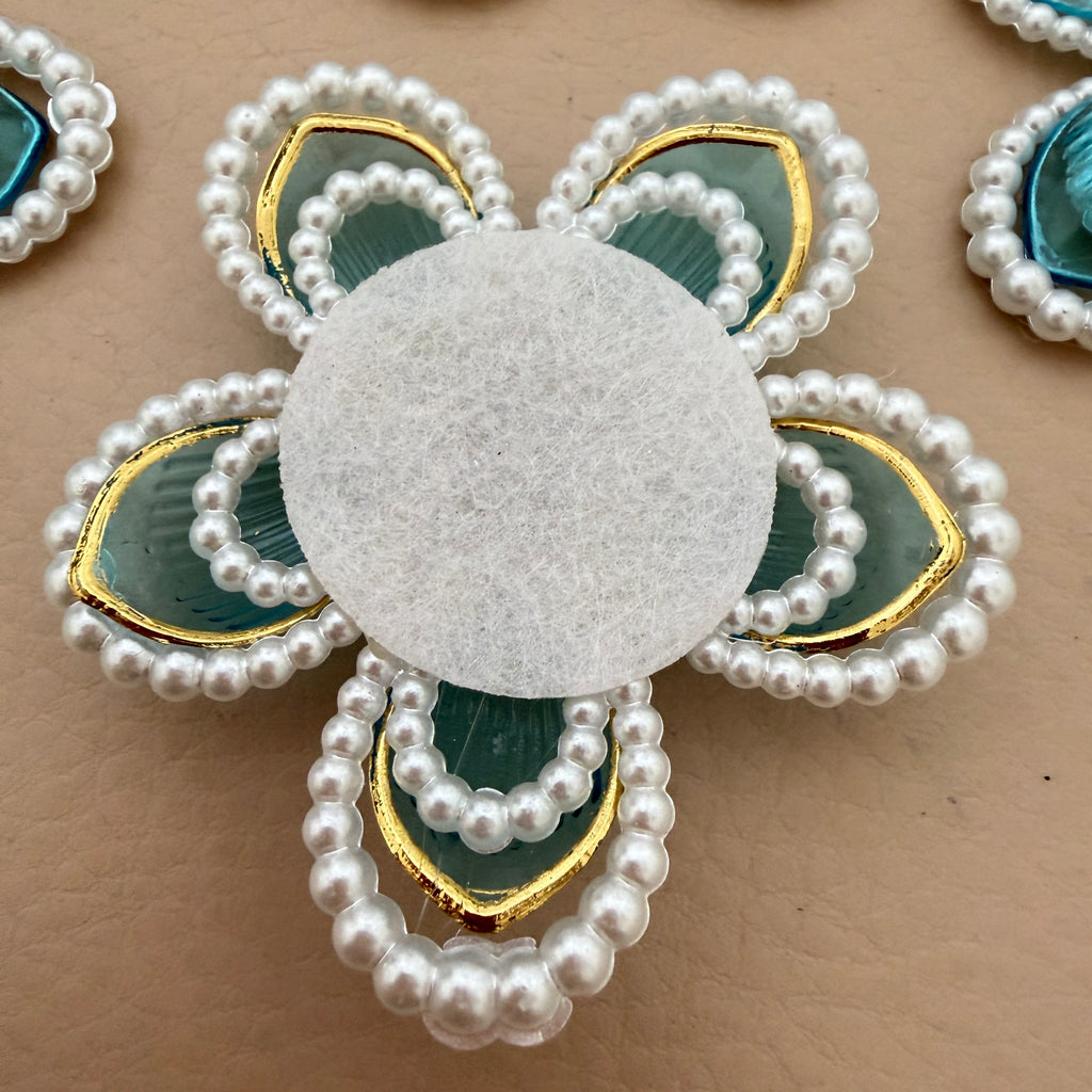 Blue crystal pearl flower patch – close up front view showing pearl and rhinestone centre