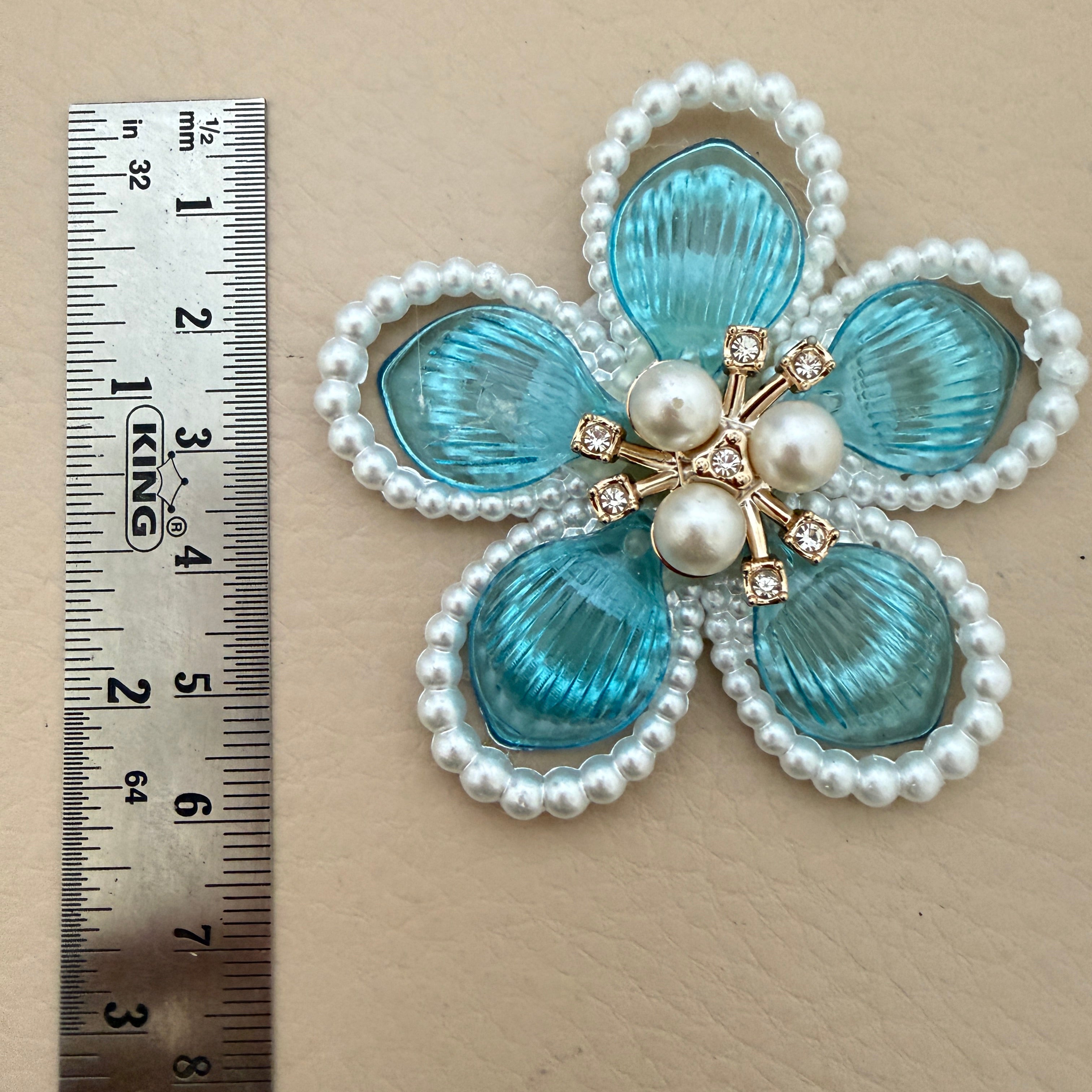 Blue crystal pearl flower patches – bulk lot view