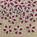 Fuchsia crystal pearl flower patches – bulk lot overhead view