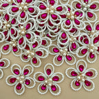 Fuchsia crystal pearl flower patches – bulk lot overhead view
