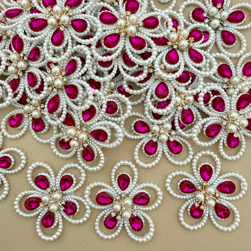 Fuchsia crystal pearl flower patches – bulk lot overhead view
