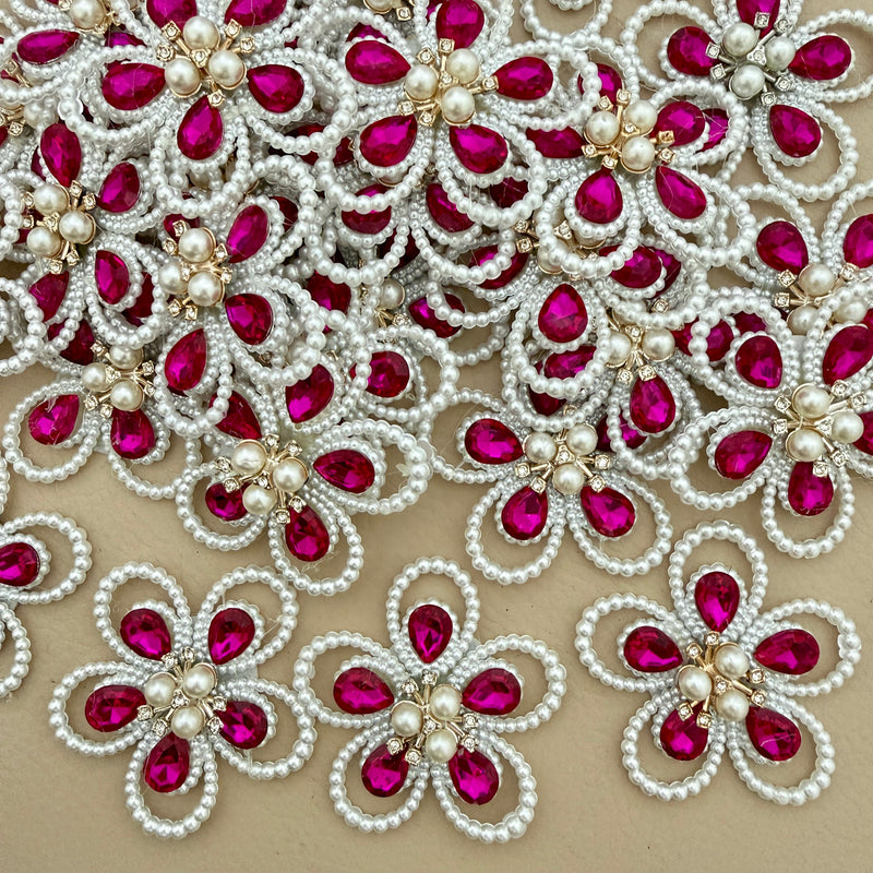 Fuchsia crystal pearl flower patches – bulk lot overhead view