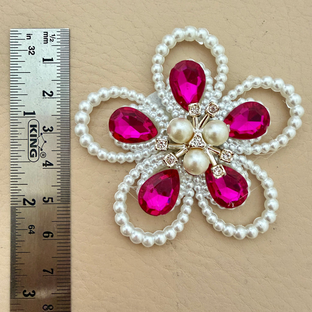 Fuchsia crystal pearl flower patch with ruler showing approx 7cm diameter