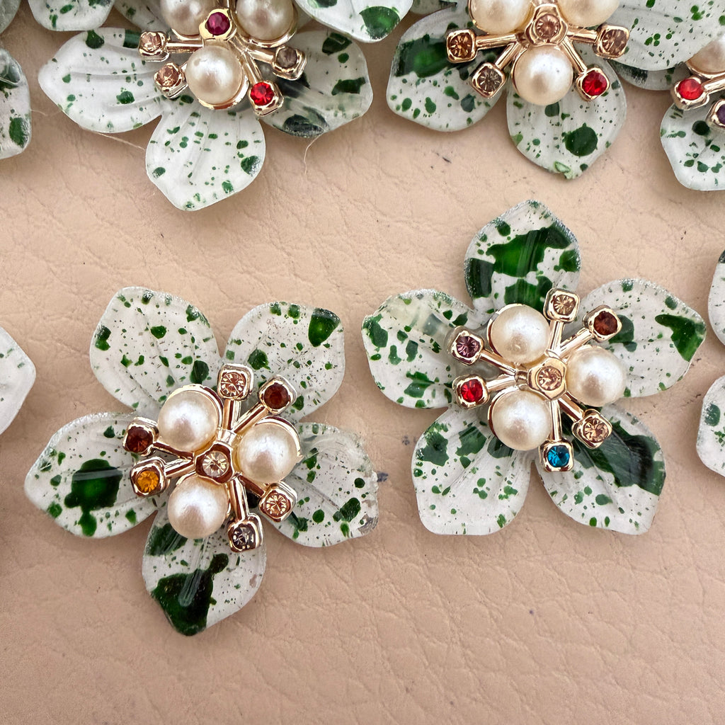 Green speckle pearl rhinestone flower patches – close up showing multicolour rhinestone centres