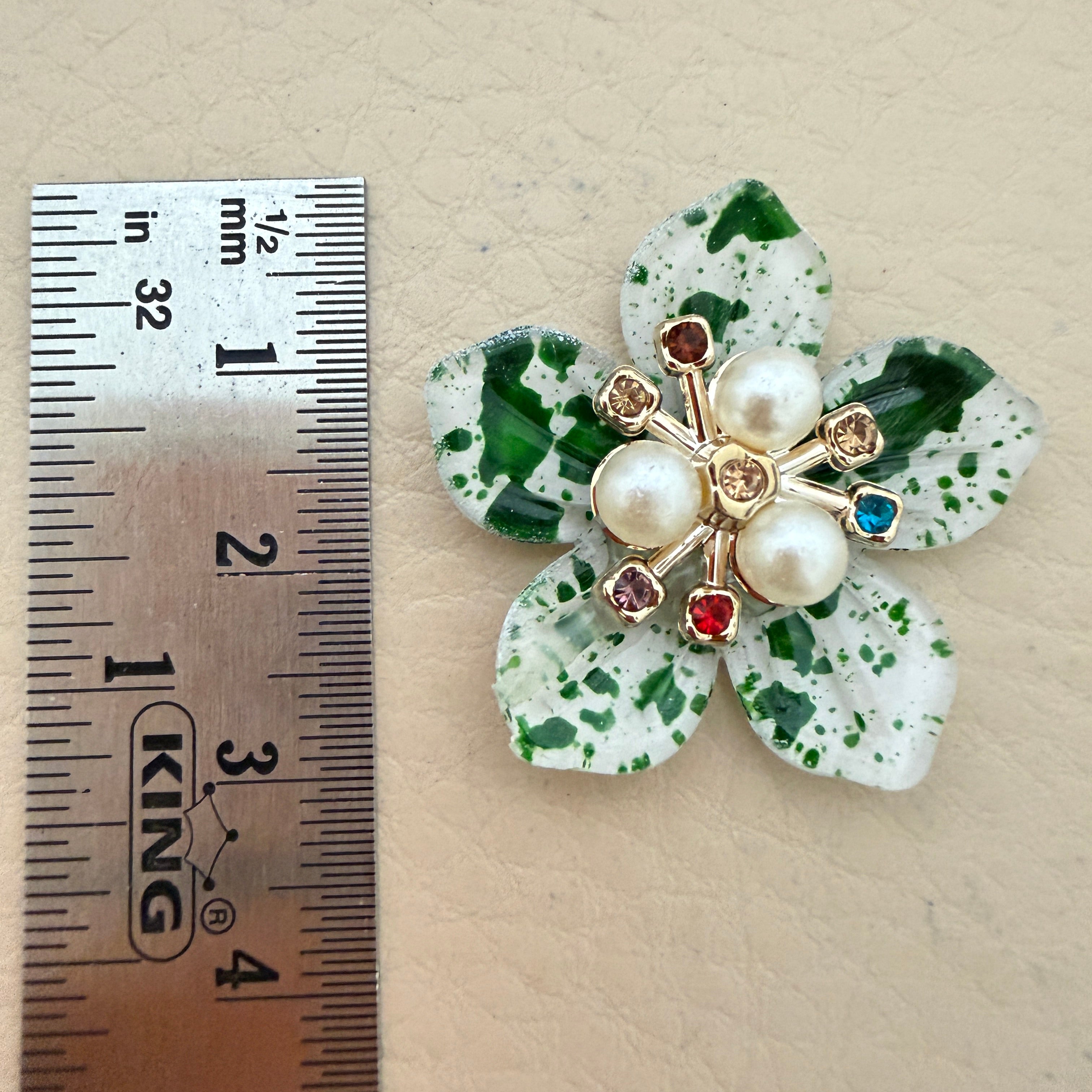 Green speckle pearl flower patch with ruler showing approx 4cm diameter