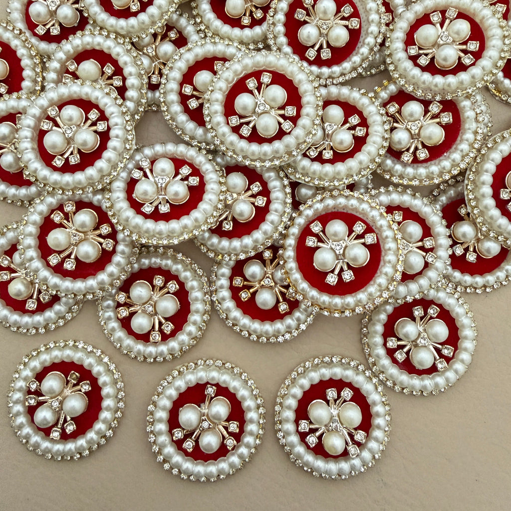 Red velvet pearl rhinestone round patches – bulk lot overhead view
