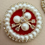 Red velvet pearl rhinestone round patch – close up front view showing pearl border and rhinestone rim