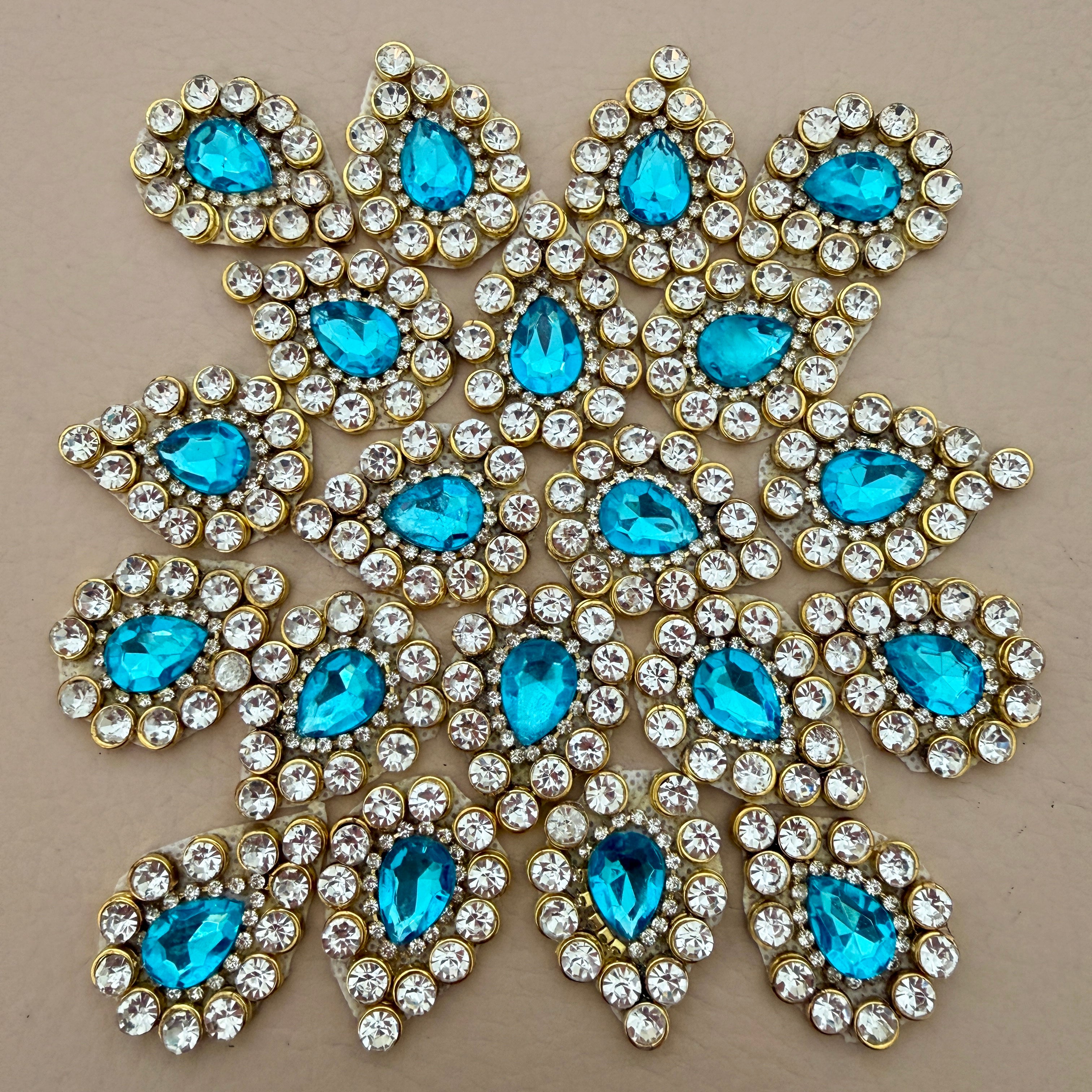 Aqua blue rhinestone crystal patches arranged in star pattern