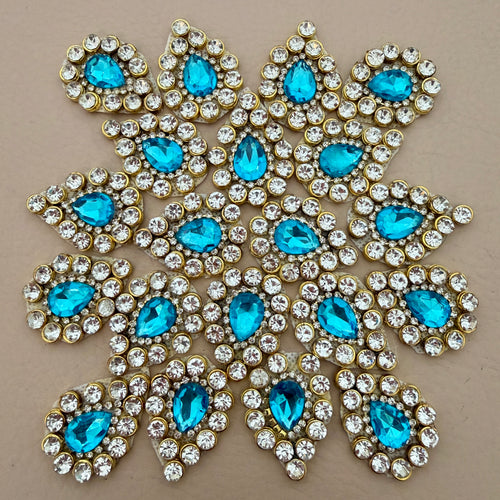 Aqua blue rhinestone crystal patches arranged in star pattern