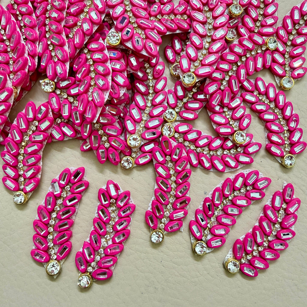 Hot pink rhinestone leaf motif patch shown next to ruler – approx 10cm length