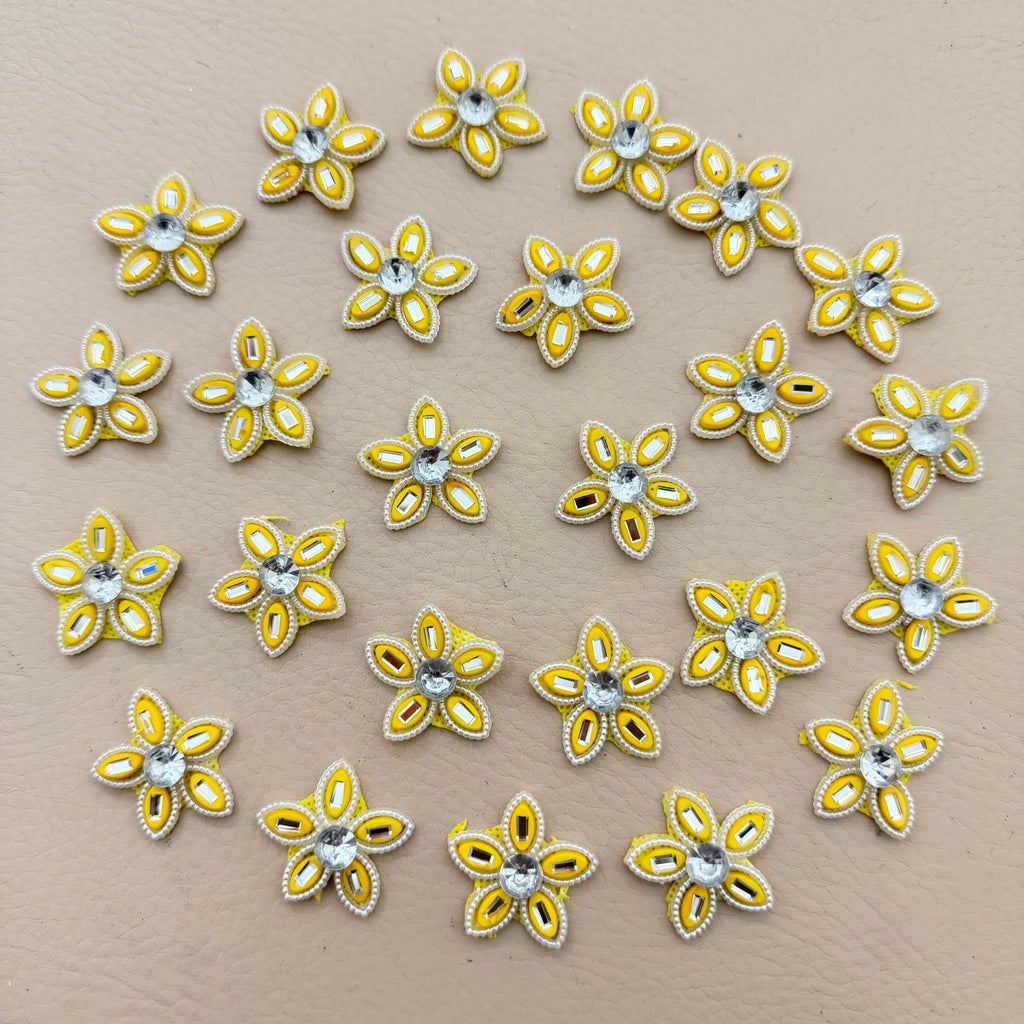 25 yellow rhinestone star flower motif patches arranged in a circle