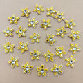 25 yellow rhinestone star flower motif patches arranged in a circle