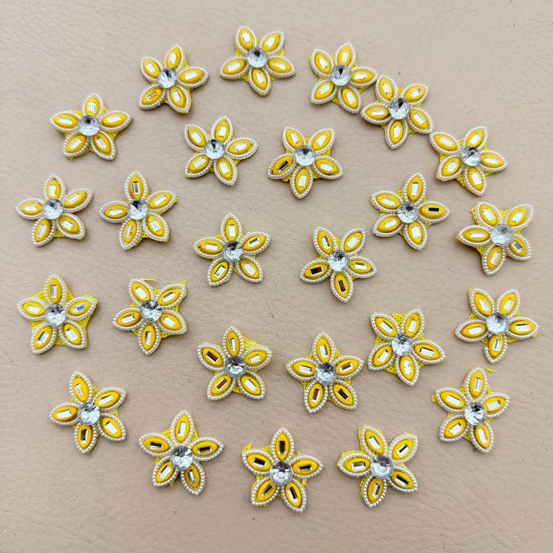 25 yellow rhinestone star flower motif patches arranged in a circle
