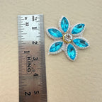 Aqua blue rhinestone star flower motif patch next to ruler showing approx 3.5cm size
