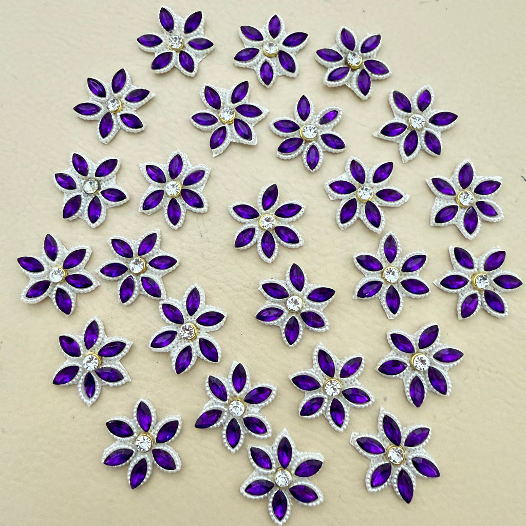 25 purple marquise rhinestone star flower motif patches laid out flat