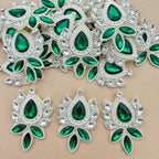 Emerald green crystal rhinestone patches bulk view