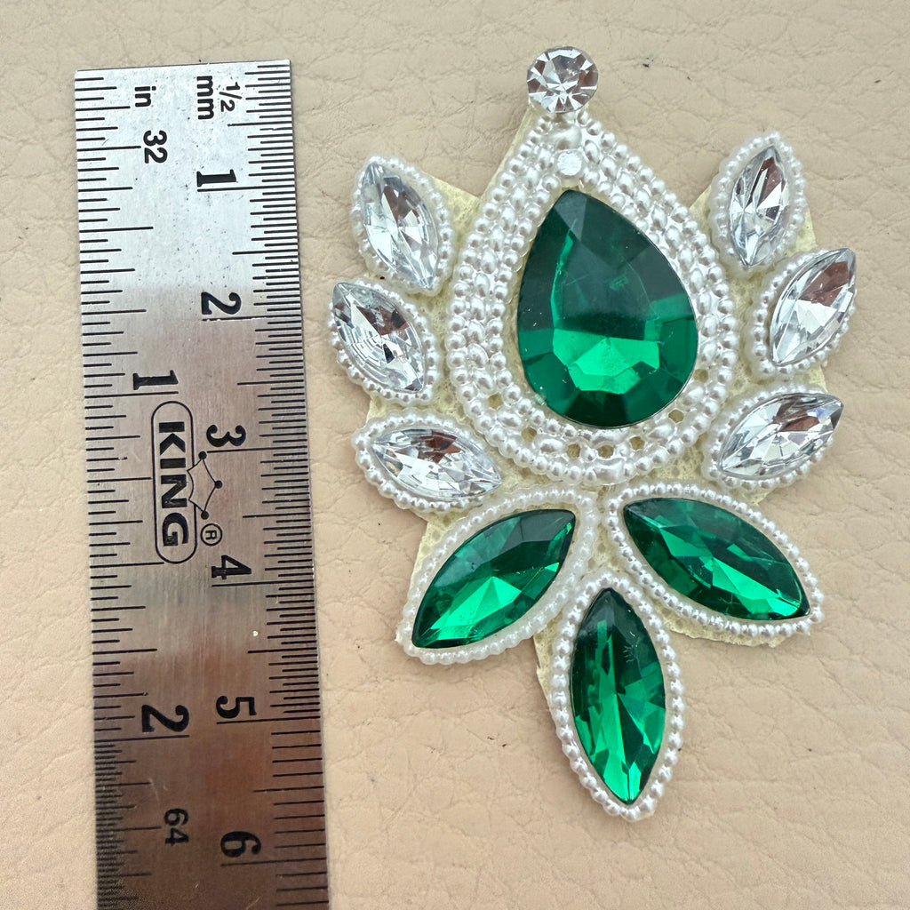 Rhinestone patch with ruler showing size approximately 7cm