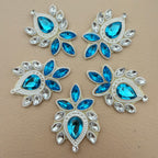 Sky blue rhinestone patch with ruler showing size approximately 7cm