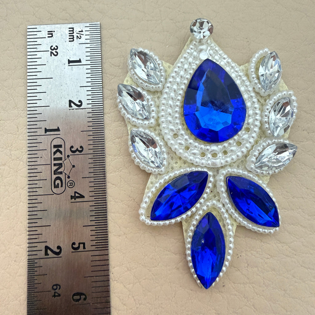 Royal blue rhinestone patch with ruler showing size approximately 6cm